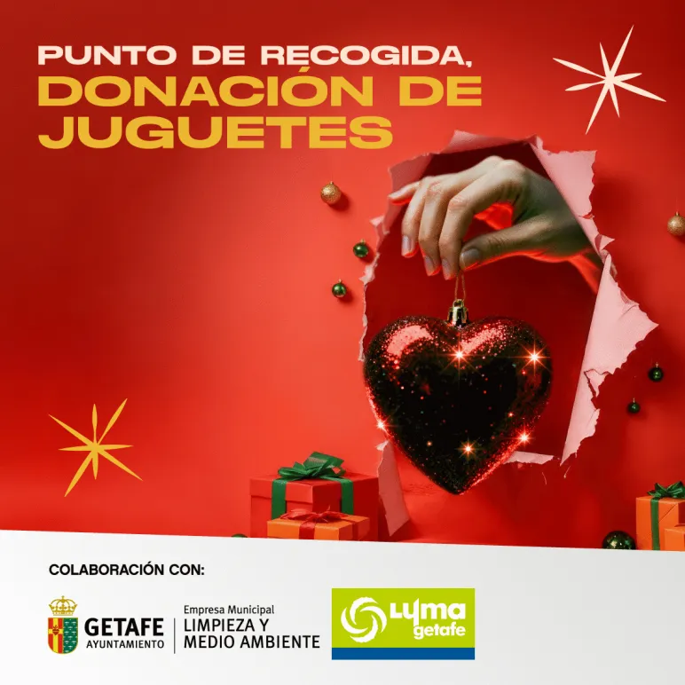 papel rompiendose para mostrar un corazón de recogida solidaria de juguetes
